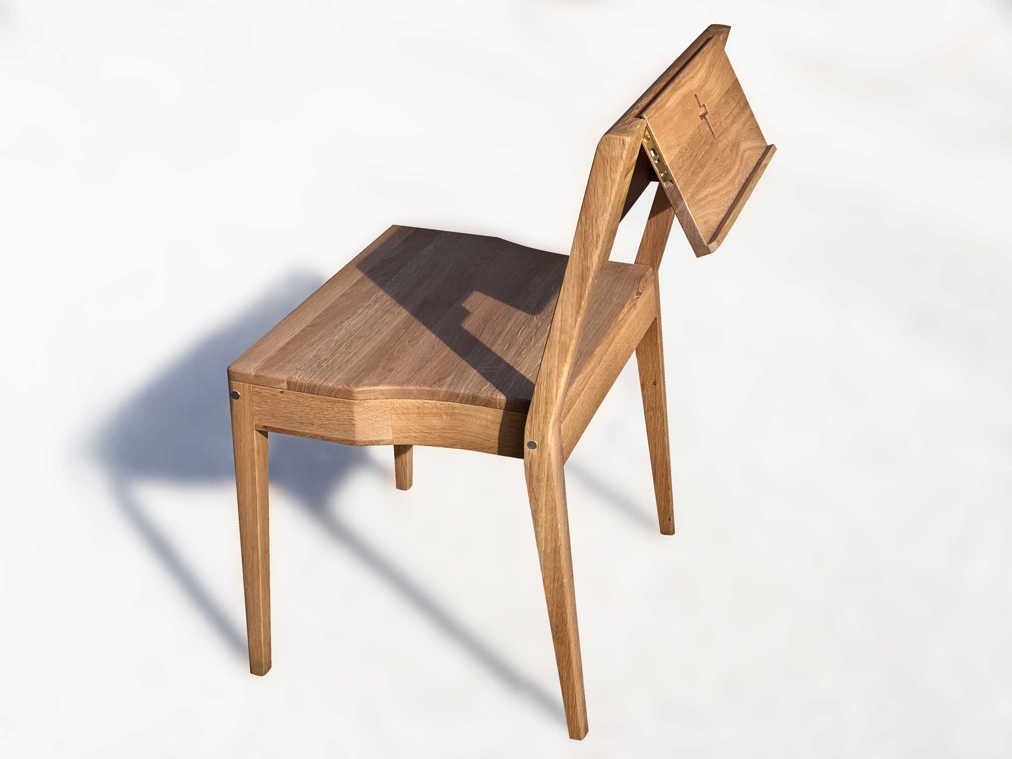Stackable church chair ZOE made of oak wood with foldable Bible holder.